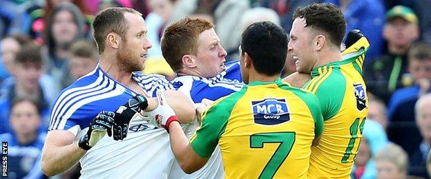 Monaghan and Donegal players square up to each other at Breffni Park