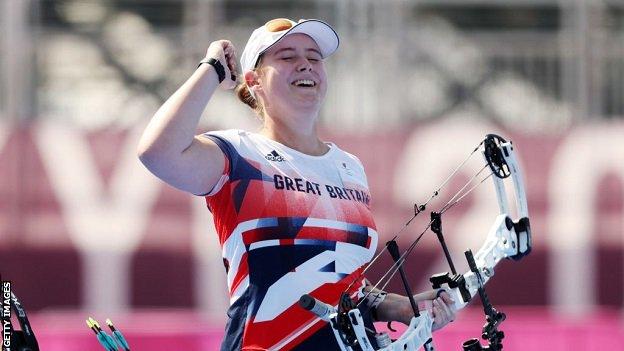 Phoebe Paterson Pine celebrates winning her gold medal