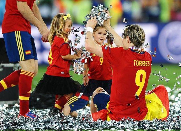 Torres celebrates with his children