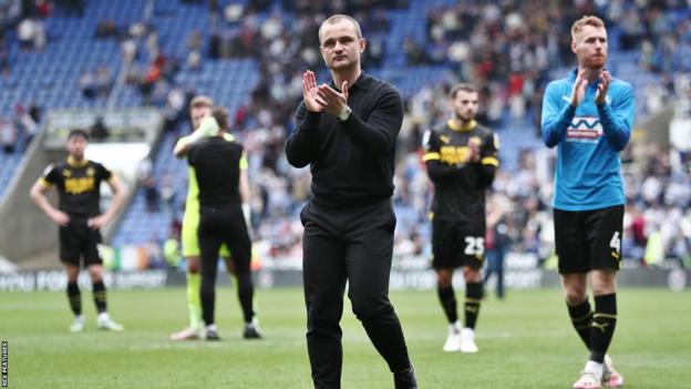 Shaun Maloney applauds the Wigan fans after their relegation is confirmed