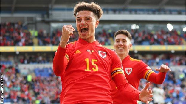 Ethan Ampadu celebrates while playing for Wales