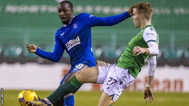 Glen Kamara in action against Chris Cadden