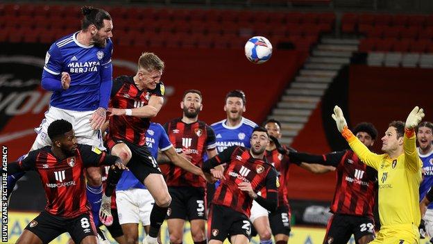 Cardiff City resolve to beat the drop after emotionally-charged victory  over Bournemouth
