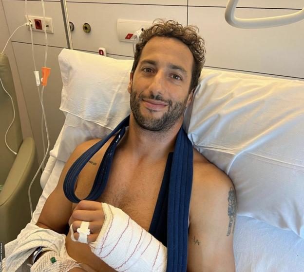 Daniel Ricciardo lying in his hospital bed in Barcelona following his surgery on his broken hand