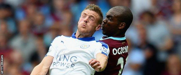 Jamie Vardy challenged by Angelo Ogbonna