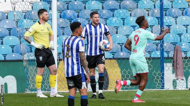 Jamal Lowe celebrates after scoring his third goal in two games