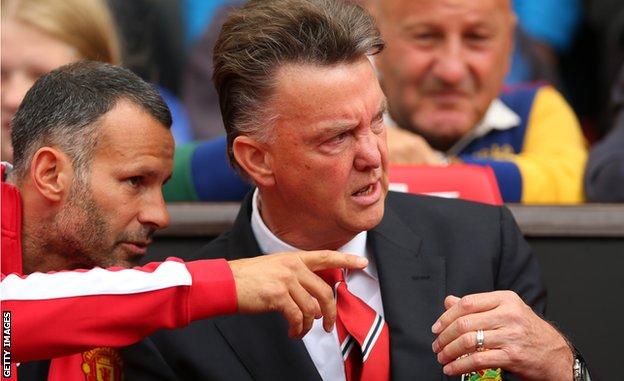 Giggs and Van Gaal pictured on the Manchester United bench in August 2014