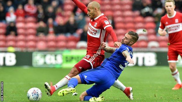 Cardiff City's Joe Bennett tackles Martin Braithwaite