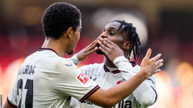 Bayer Leverkusen's Jeremie Frimpong celebrates scoring against Heidenheim