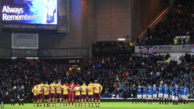 Rangers and Motherwell players observe minute's silence