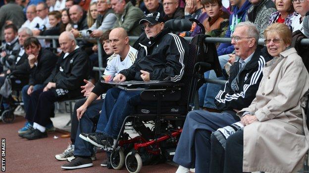Disabled supporters watching a football match