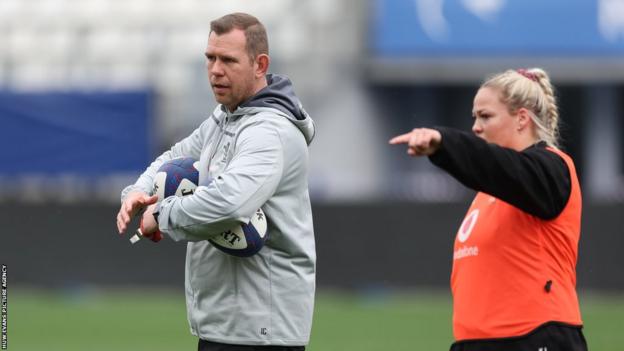 Ioan Cunningham in training with Kelsey Jones
