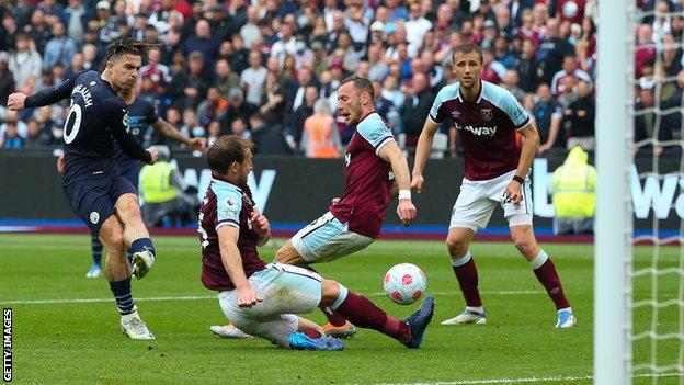 Manchester City's Jack Grealish has a shot at goal during his side's game at West Ham