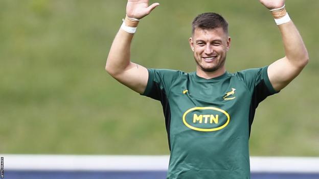 Handre Pollard smiles during a South Africa training session