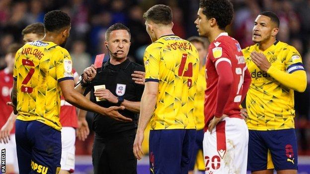 David Webb's decision to award a first-half penalty and send off Albion defender Darnell Furlong for handball had a major say on the outcome