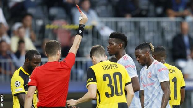 Aaron Wan-Bissaka is shown a straight red card during Manchester United's Champions League defeat to Young Boys