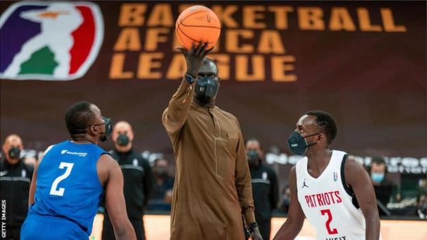 BAL president Amadou Gallo Fall performs the ceremonial tip-off of the inaugural tournament on 16 May