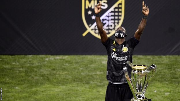 Ghana and Columbus Crew's Jonathan Mensah with the MLS Cup