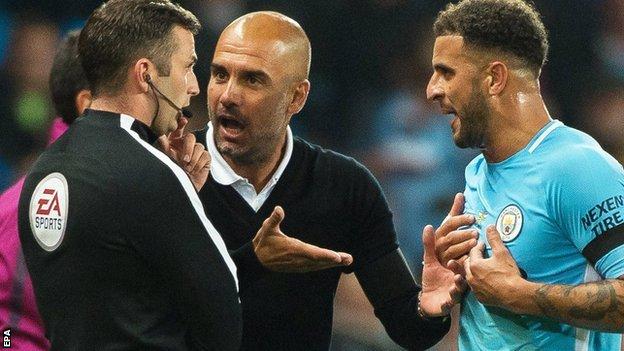 Manchester City's Kyle Walker and Pep Guardiola unhappy with red card