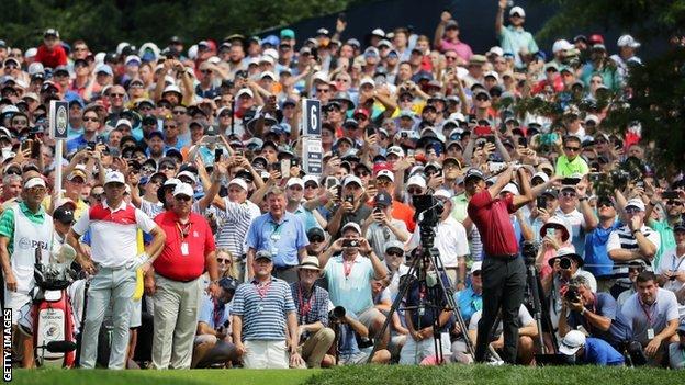 Tiger Woods playing a shot at Bellerive