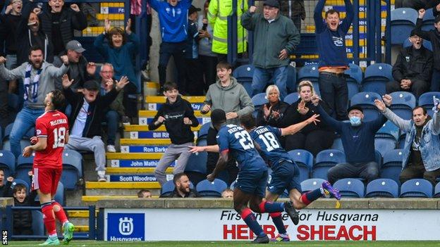 Ethon Varian celebrates in front of the Raith Rovers fans after levelling