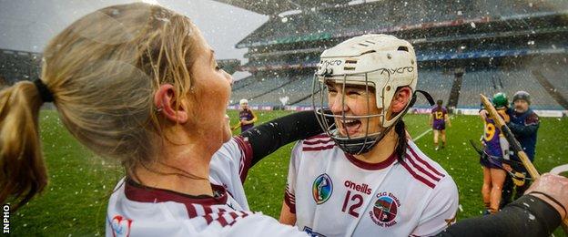 Slaughtneil joint-captains Grainne O'Kane and Siobhan Bradley celebrate the club's third All-Ireland title in 2019