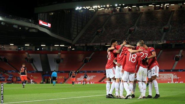 Manchester United players celebrate at Old Trafford