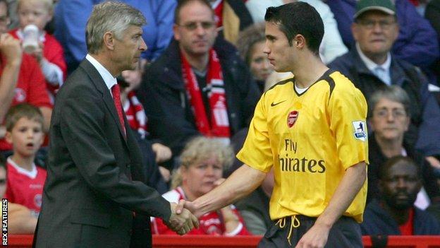 Robin Van Persie shakes the hand of Arsenal manager Arsene Wenger