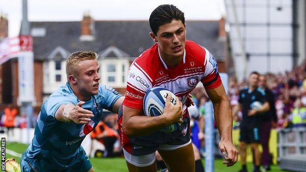 Louis Rees-Zammit scores a try for Gloucester
