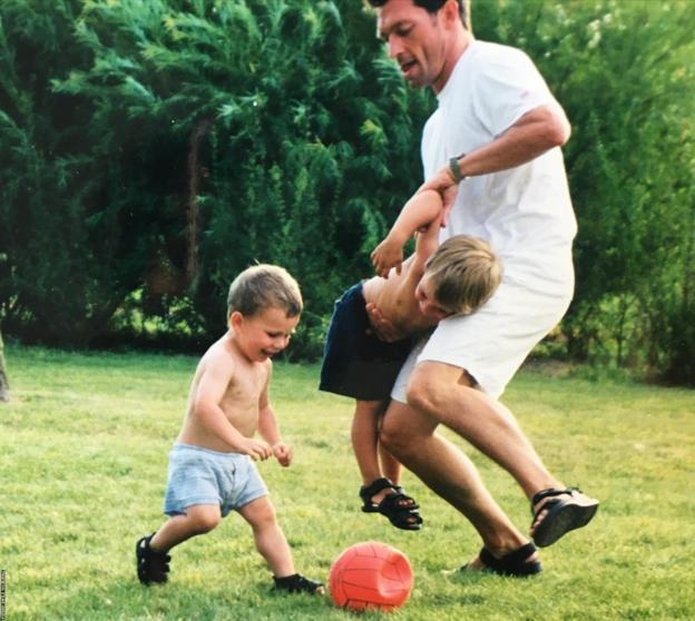 Pierre-Emile Hojbjerg, left, plays football with his dad and brother