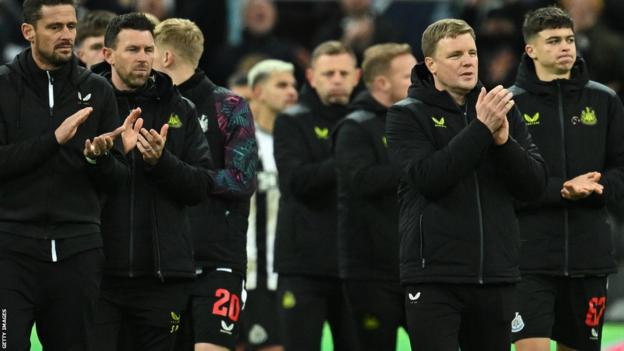 Newcastle players and Eddie Howe
