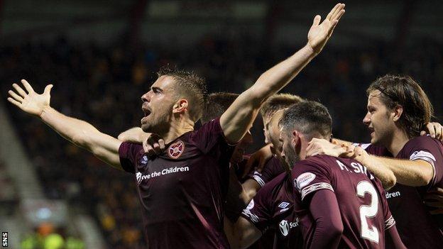 Olly Lee celebrates his late goal for Hearts
