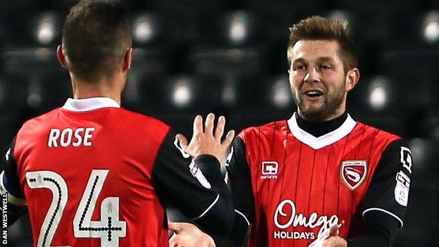 Morecambe's Tom Barkhuizen scores