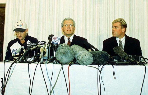 Mark Waugh, Malcolm Speed, CEO of the Australian Cricket Board and Shane Warne at a press conference admitting to accepting money from an Indian bookmaker before a one day match four years ago