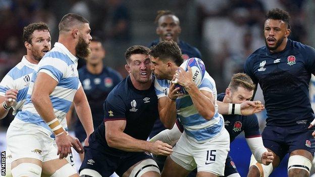 Tom Curry makes head on head contact with Argentina's Juan Mallia Cruz