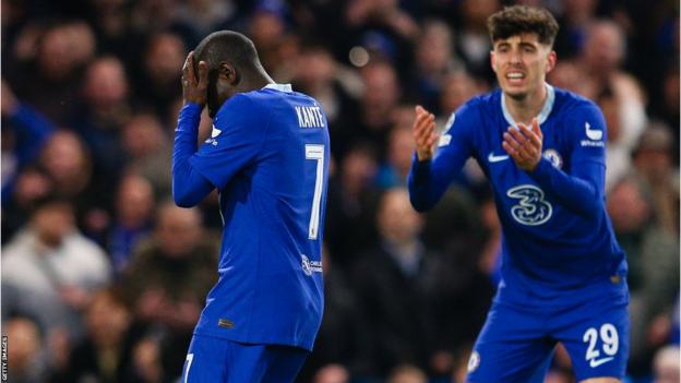 N'Golo Kante puts his caput  successful  his hands aft  missing a chance, with Kai Havertz reacting successful  the background