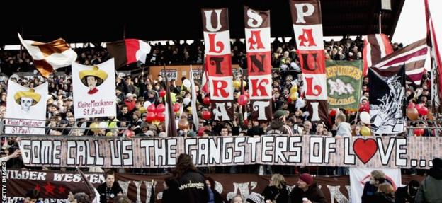 St Pauli fans display banners before a 2007 third tier match