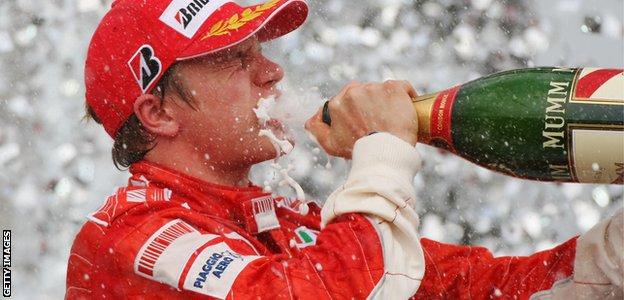 Kimi Raikkonen celebrates winning the 2007 drivers' championship