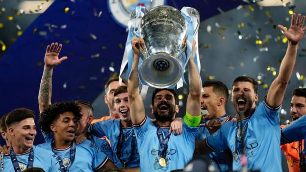Ilkay Gundogan lifts the Champions League trophy