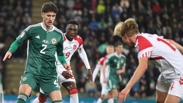 Trai Hume in action for NI against Denmark