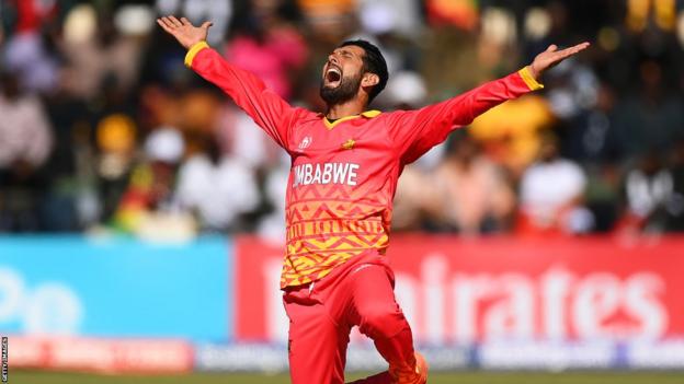 Sikandar Raza celebrates taking a wicket