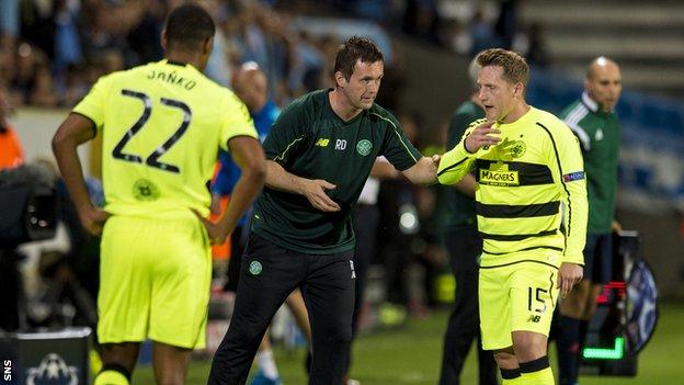 Celtic manager Ronny Deila speaks to his players during the defeat by Malmo