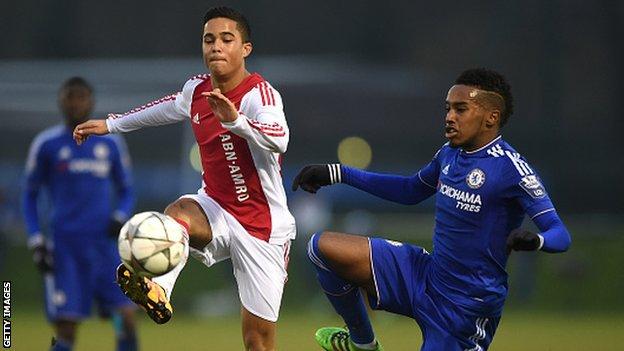 Justin Kluivert (left0 in action for Ajax against Chelsea in a Uefa Youth League match