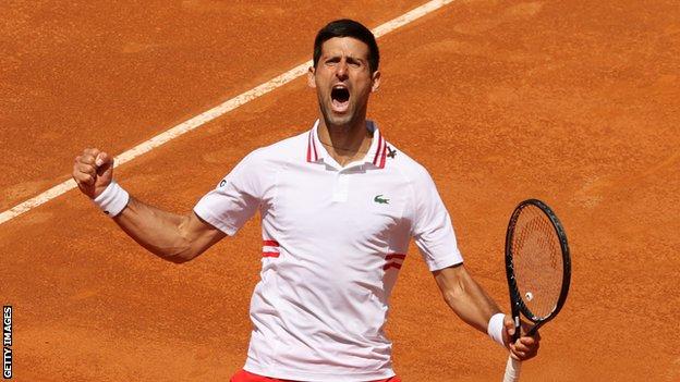 Novak Djokovic celebrates after beating Stefanos Tsitsipas at the Italian Open