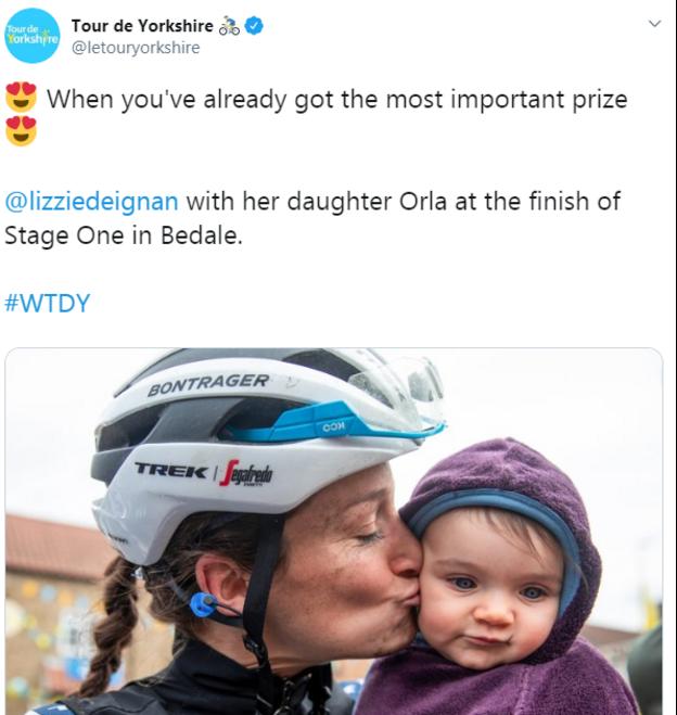 A tweet showing Lizzie Deignan kissing her daughter Orla at the finish line