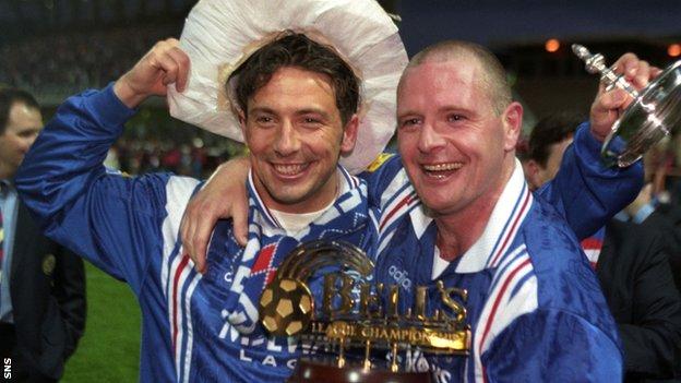 Derek McInnes celebrates winning Rangers' ninth league title in a row in 1997