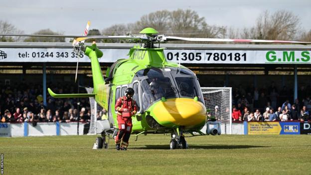 Air ambulance lands on pitch