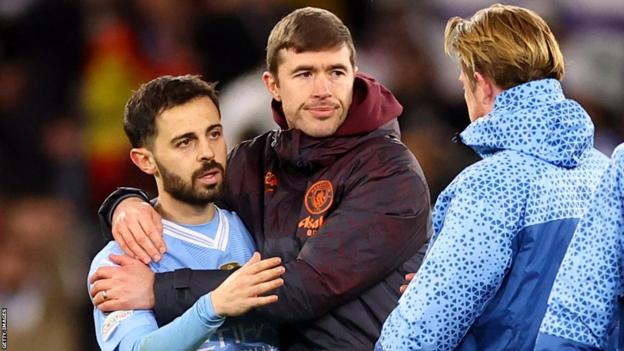 Bernardo Silva is consoled after the game