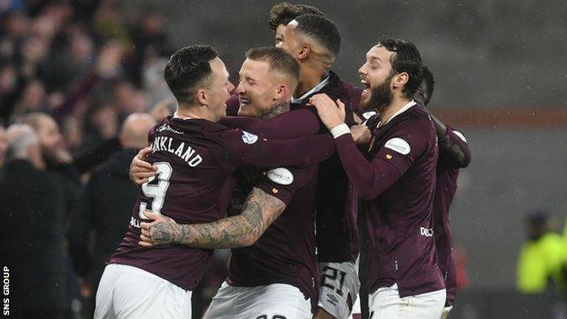 Hearts Stephen Humphrys celebrates with teammates after making it 3-1 during a cinch Premiership match between Heart of Midlothian and Dundee United