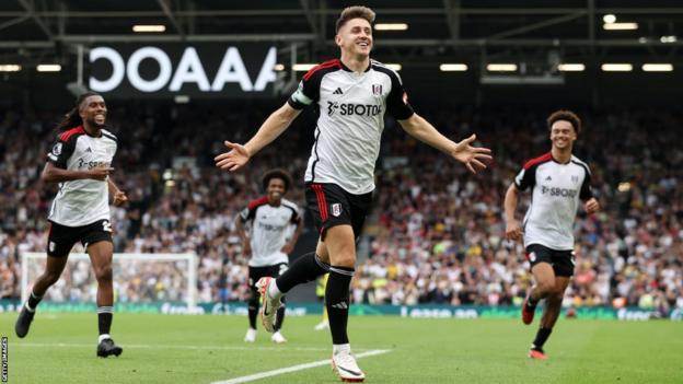 Tom Cairney celebrates Fulham's goal against Sheffield United